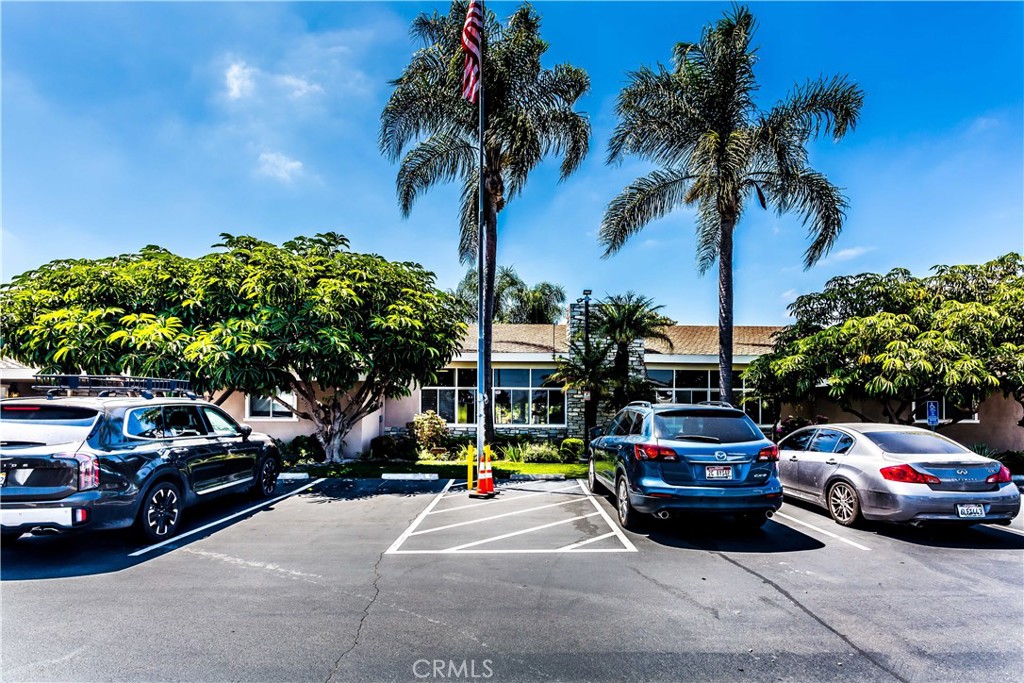 3050 West Ball Road, Unit 200 Anaheim, CA 92804 - Photo 19 of 21 a cars parked in front of a house