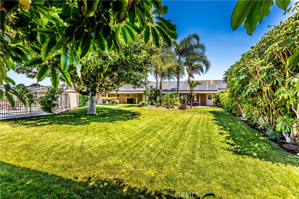 3050 West Ball Road, Unit 200 Anaheim, CA 92804 - Photo 20 of 21 a front view of a house with swimming pool