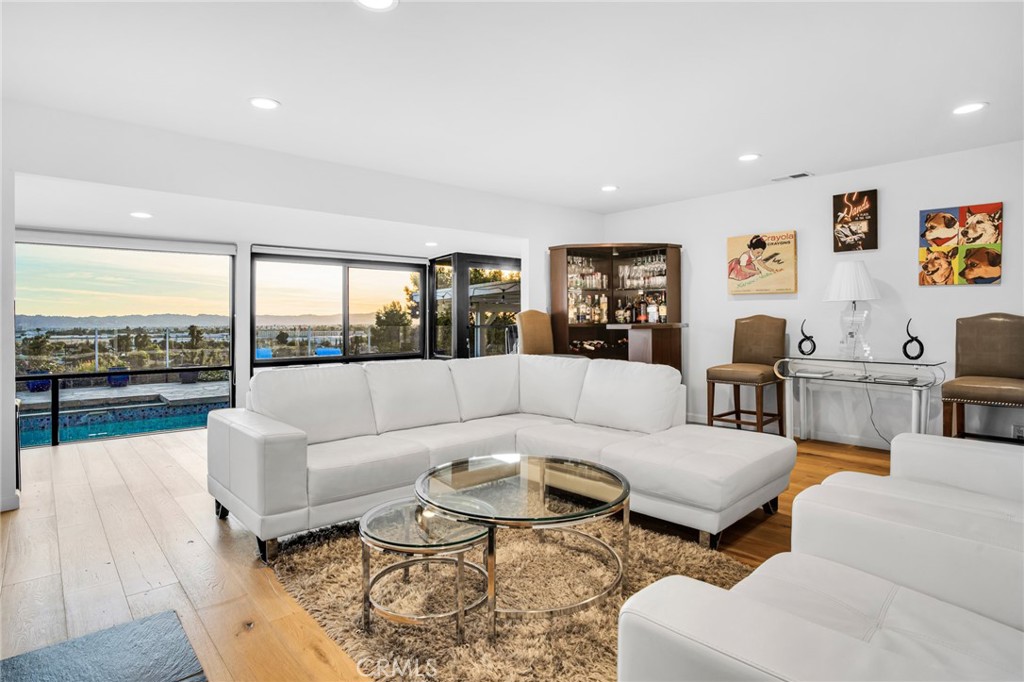 10208 Sully Drive Sun Valley, CA 91352 - Photo 12 of 44 a living room with furniture and a large window