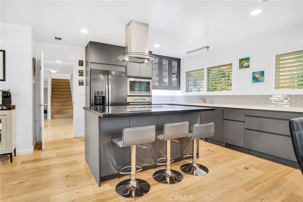 10208 Sully Drive Sun Valley, CA 91352 - Photo 14 of 44 a kitchen with a sink cabinets and counter space