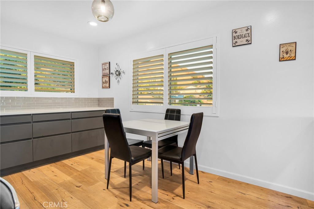 10208 Sully Drive Sun Valley, CA 91352 - Photo 16 of 44 a view of a dining room with furniture and window
