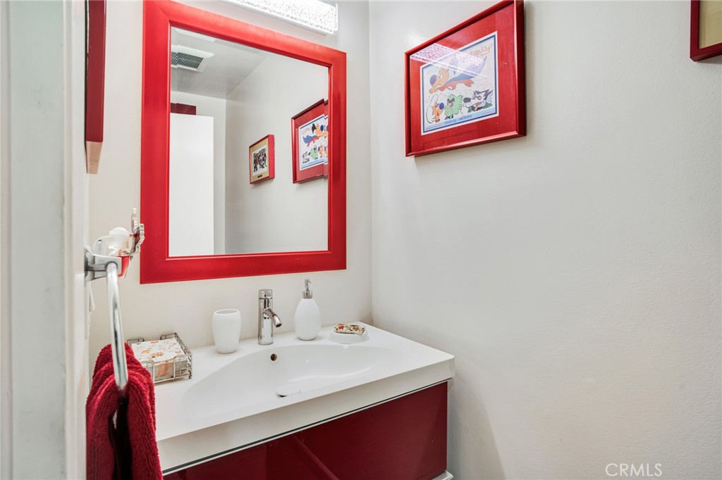 10208 Sully Drive Sun Valley, CA 91352 - Photo 17 of 44 a bathroom with a sink and a mirror