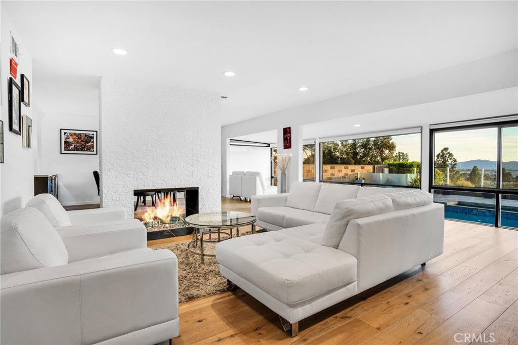 10208 Sully Drive Sun Valley, CA 91352 - Photo 26 of 44 a living room with furniture and a large window