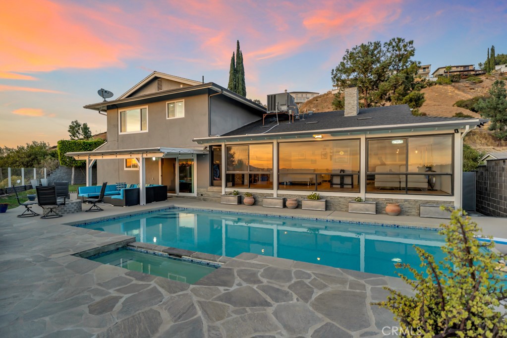 10208 Sully Drive Sun Valley, CA 91352 - Photo 35 of 44 a view of a house with a yard and sitting area