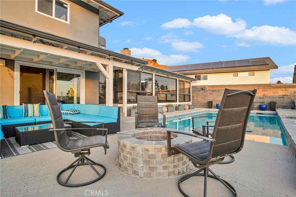 10208 Sully Drive Sun Valley, CA 91352 - Photo 41 of 44 a front view of a house with patio furniture