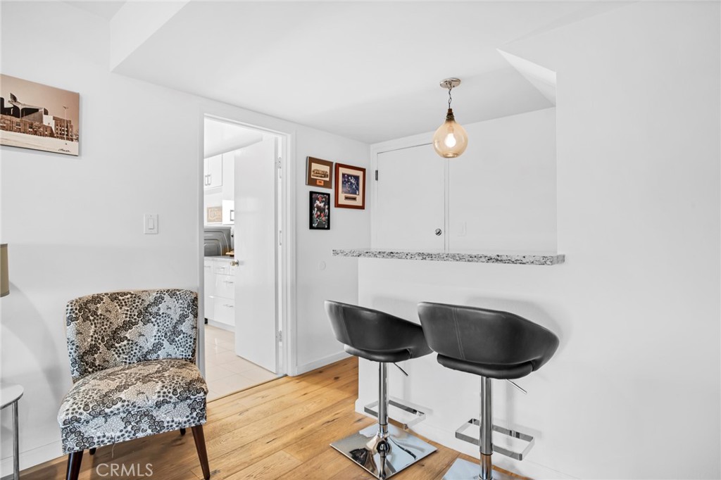 10208 Sully Drive Sun Valley, CA 91352 - Photo 5 of 44 a living room with furniture and a potted plant