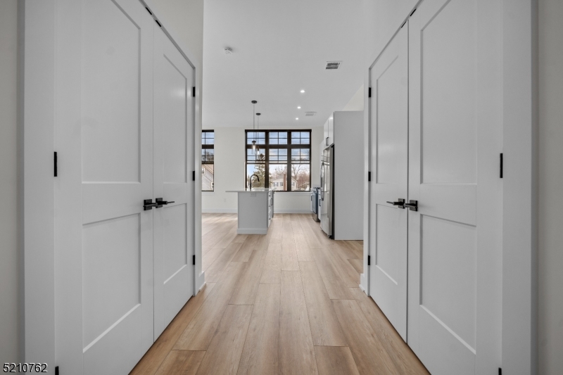 1 Union Avenue, Unit 207 Cresskill, NJ 07626 - Photo 12 of 49 a view of a hallway with wooden floor