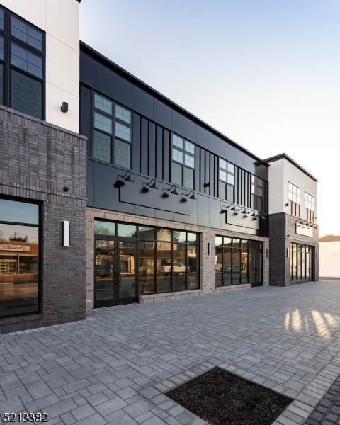 1 Union Avenue, Unit 207 Cresskill, NJ 07626 - Photo 3 of 49 a view of a house with a balcony