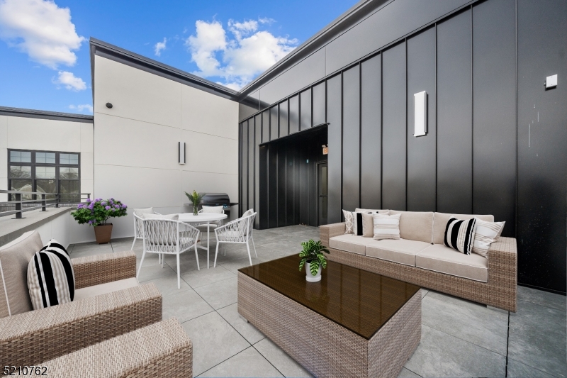 1 Union Avenue, Unit 207 Cresskill, NJ 07626 - Photo 47 of 49 a living room with furniture