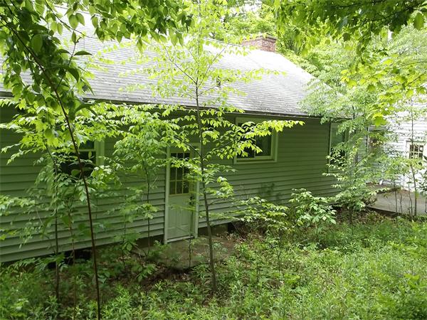 568 Ridge Road Wilbraham, MA 01095 - Photo 1 of 18 a view of a garden from a bench