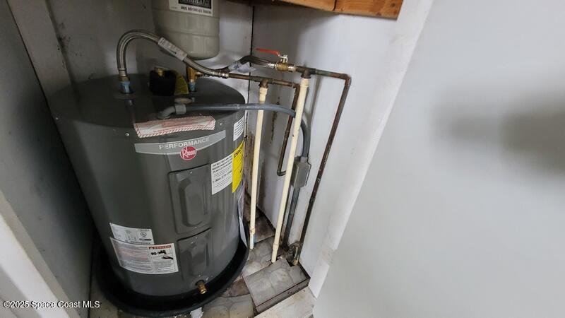 1666 Terrace Street Cocoa, FL 32922 - Photo 15 of 24 a view of water heater room