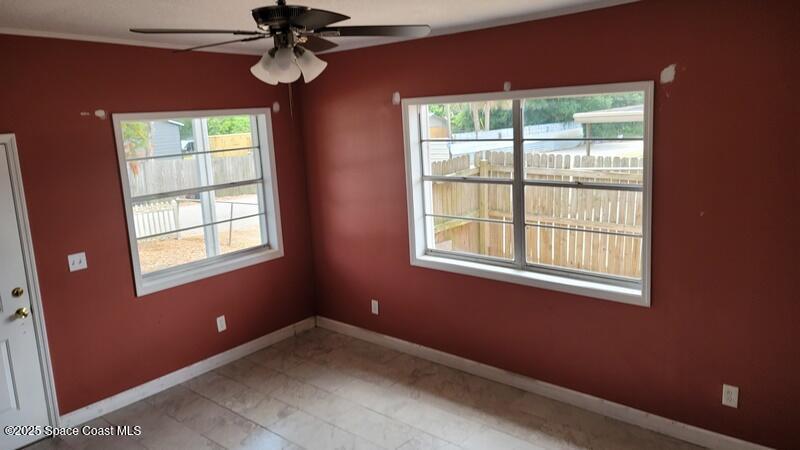 1666 Terrace Street Cocoa, FL 32922 - Photo 21 of 24 a view of an empty room with a window