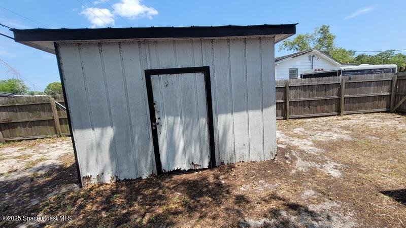 1666 Terrace Street Cocoa, FL 32922 - Photo 5 of 24 a view of a house with a window