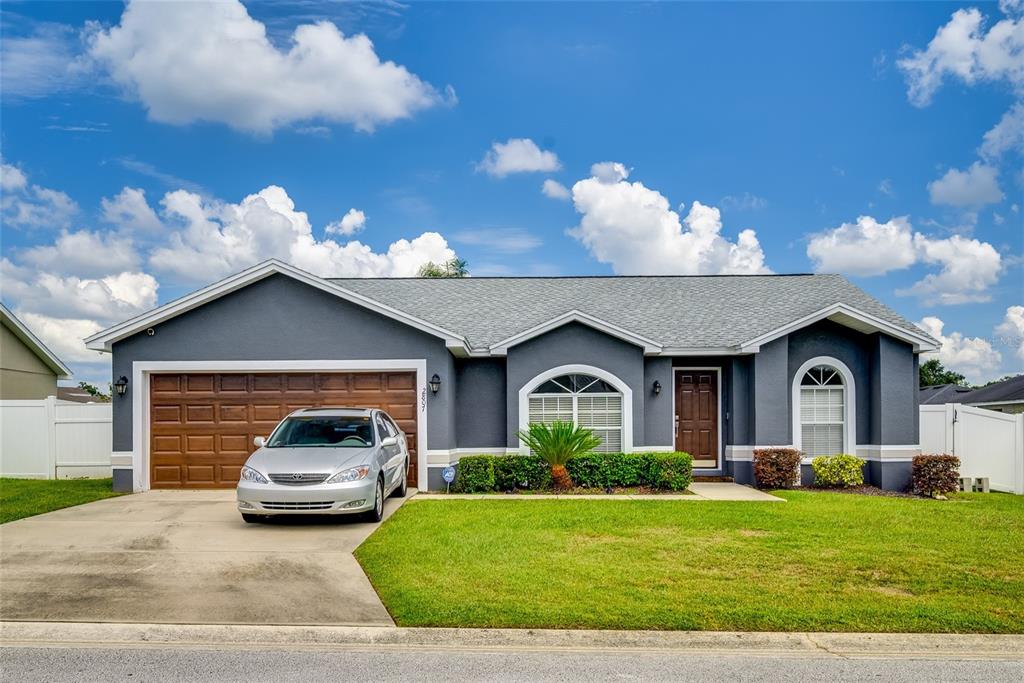 a house view with a garden space
