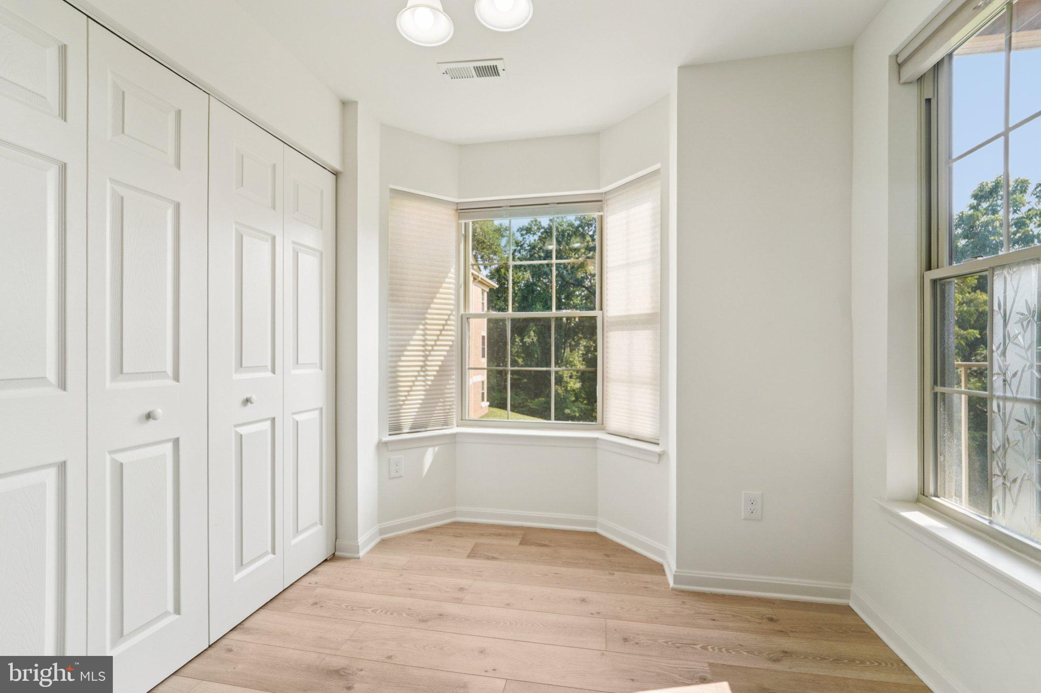 3500 Thomas Pointe Court, Unit 2B Abingdon, MD 21009 - Photo 11 of 37 an empty room with windows