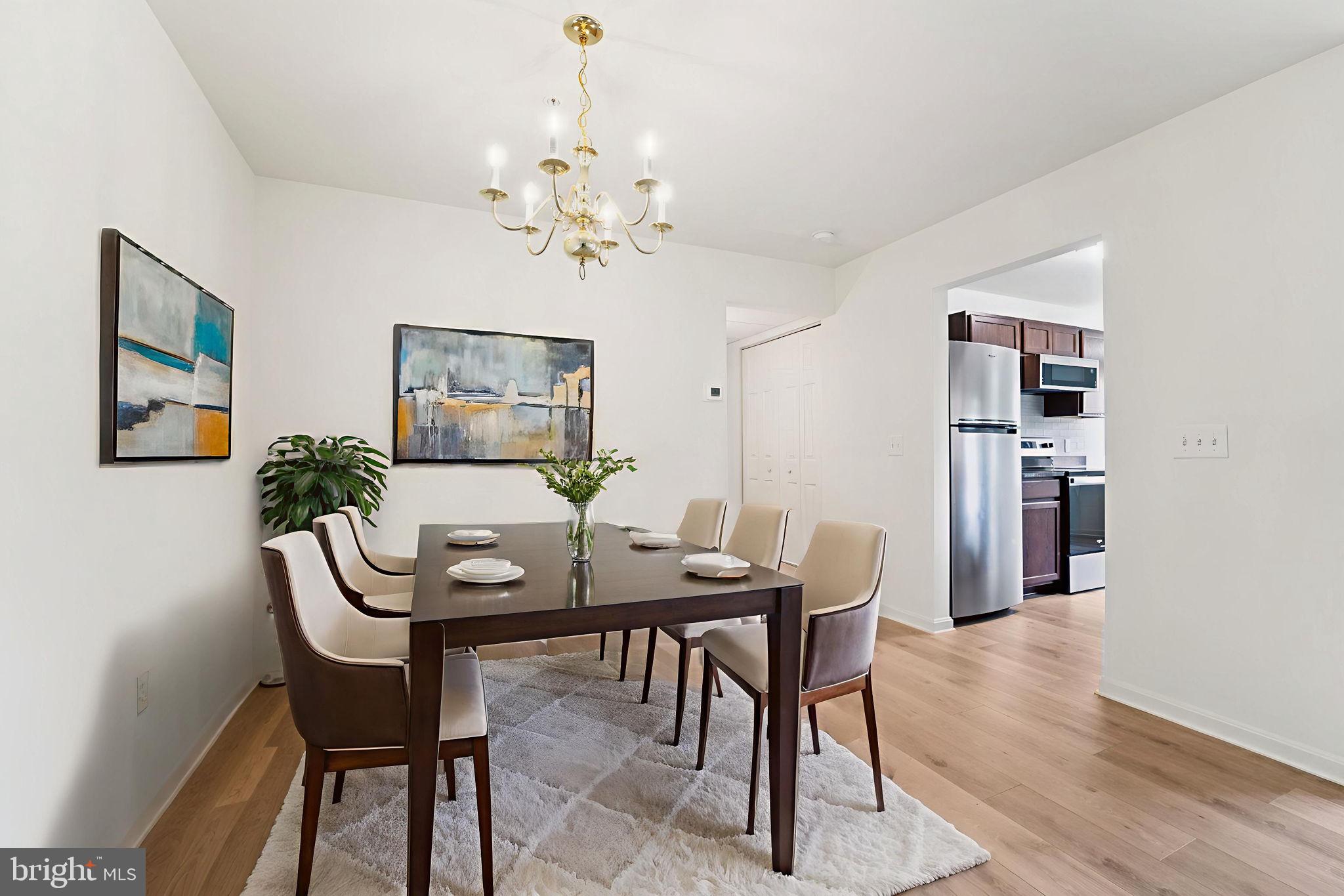 3500 Thomas Pointe Court, Unit 2B Abingdon, MD 21009 - Photo 14 of 37 a view of a dining room with furniture and wooden floor