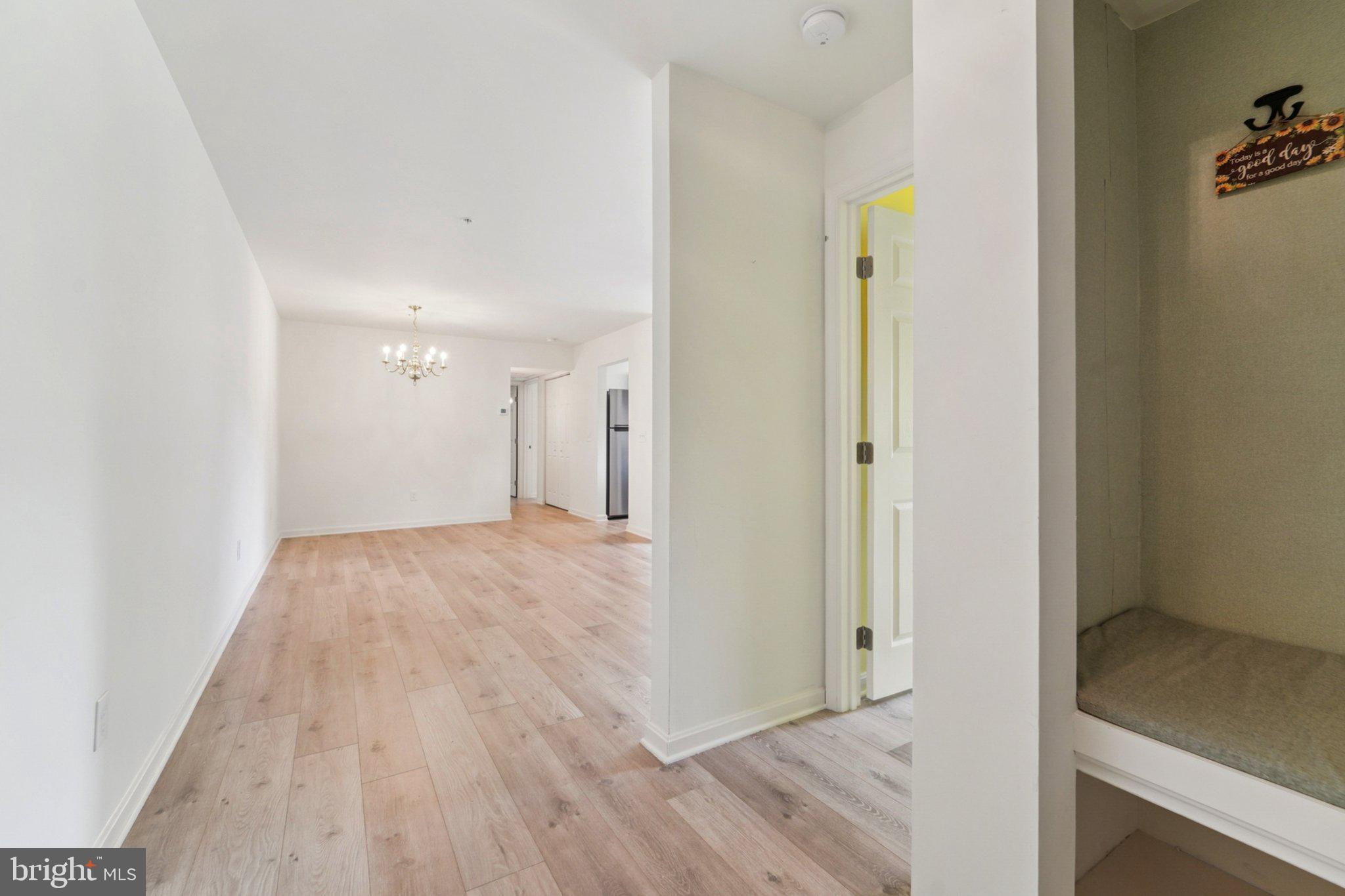 3500 Thomas Pointe Court, Unit 2B Abingdon, MD 21009 - Photo 15 of 37 a view of a hallway with wooden floor