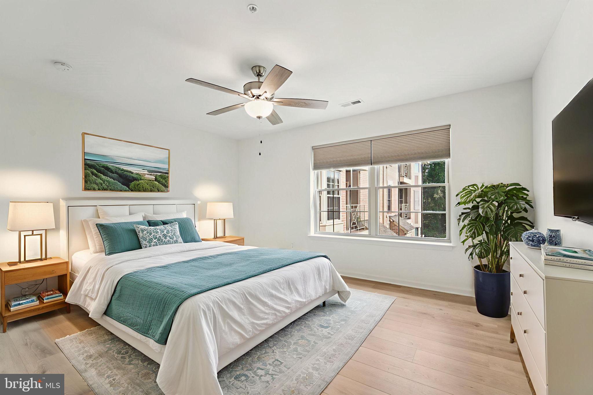 3500 Thomas Pointe Court, Unit 2B Abingdon, MD 21009 - Photo 18 of 37 a bedroom with a bed chandelier and a window