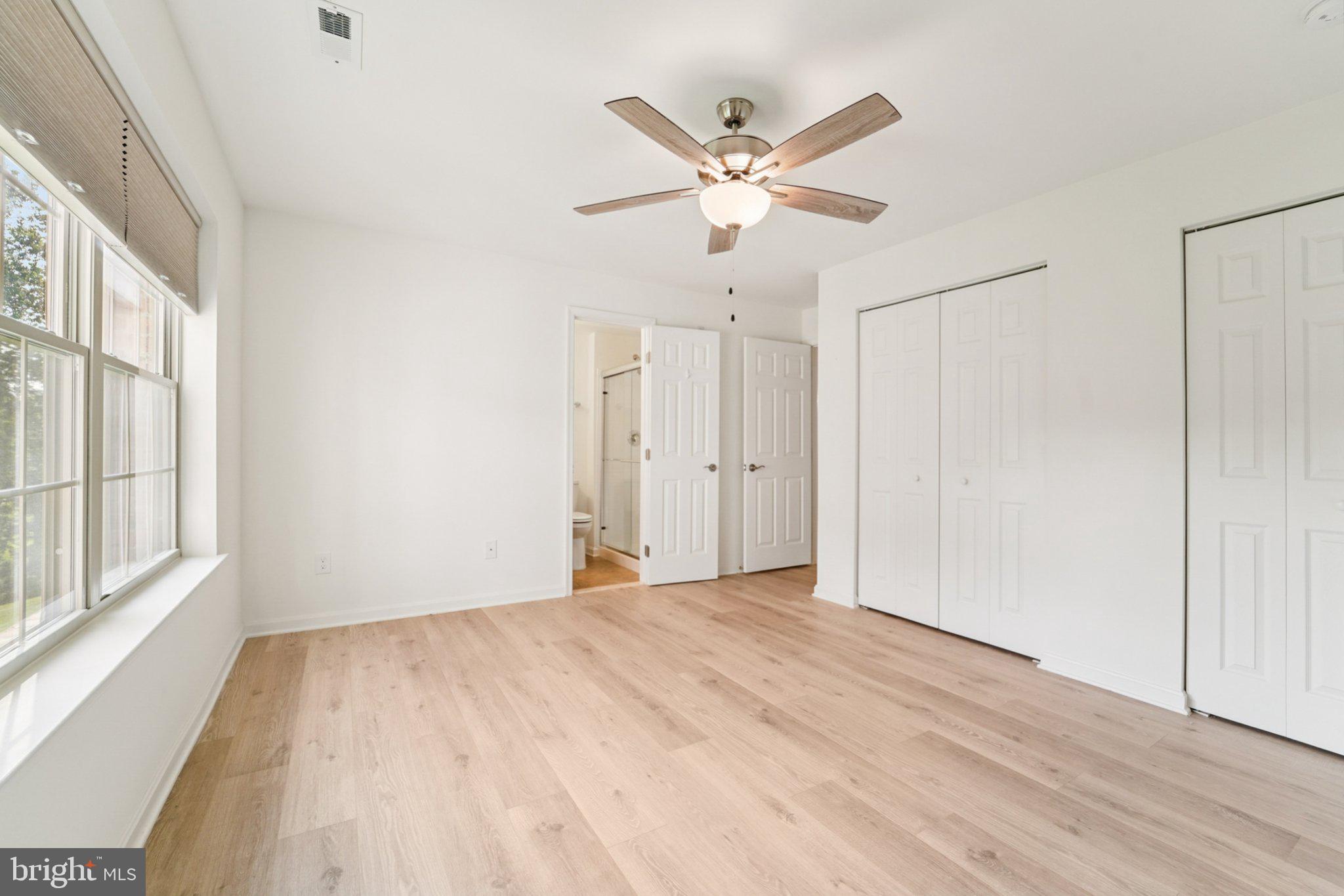 3500 Thomas Pointe Court, Unit 2B Abingdon, MD 21009 - Photo 19 of 37 a view of a big room with wooden floor and windows in a room
