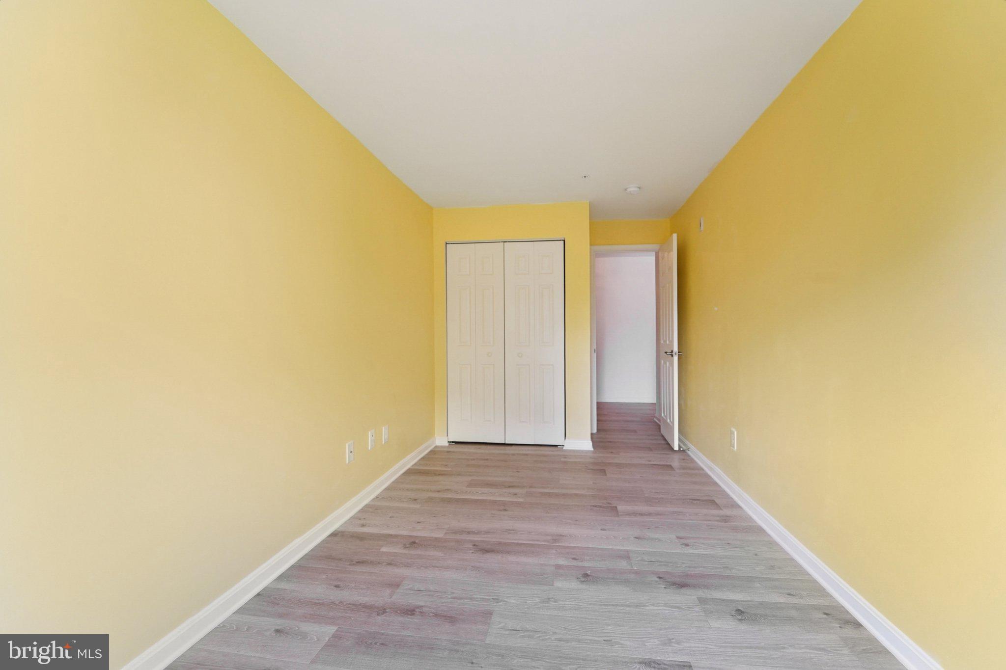 3500 Thomas Pointe Court, Unit 2B Abingdon, MD 21009 - Photo 25 of 37 a view of an empty room with wooden floor