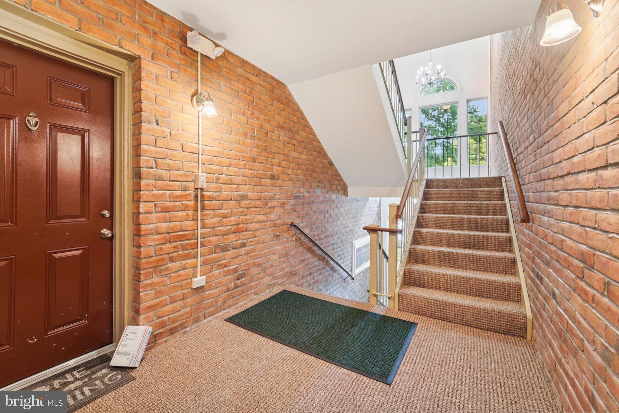 3500 Thomas Pointe Court, Unit 2B Abingdon, MD 21009 - Photo 28 of 37 a view of entryway with wooden floor and stairs