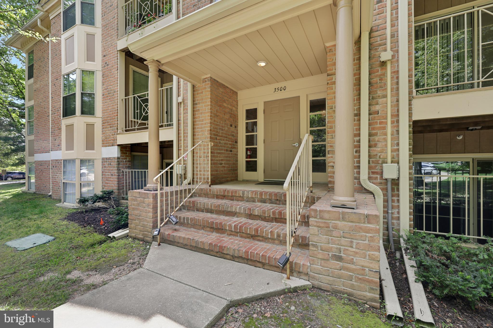 3500 Thomas Pointe Court, Unit 2B Abingdon, MD 21009 - Photo 32 of 37 a front view of a house with a yard