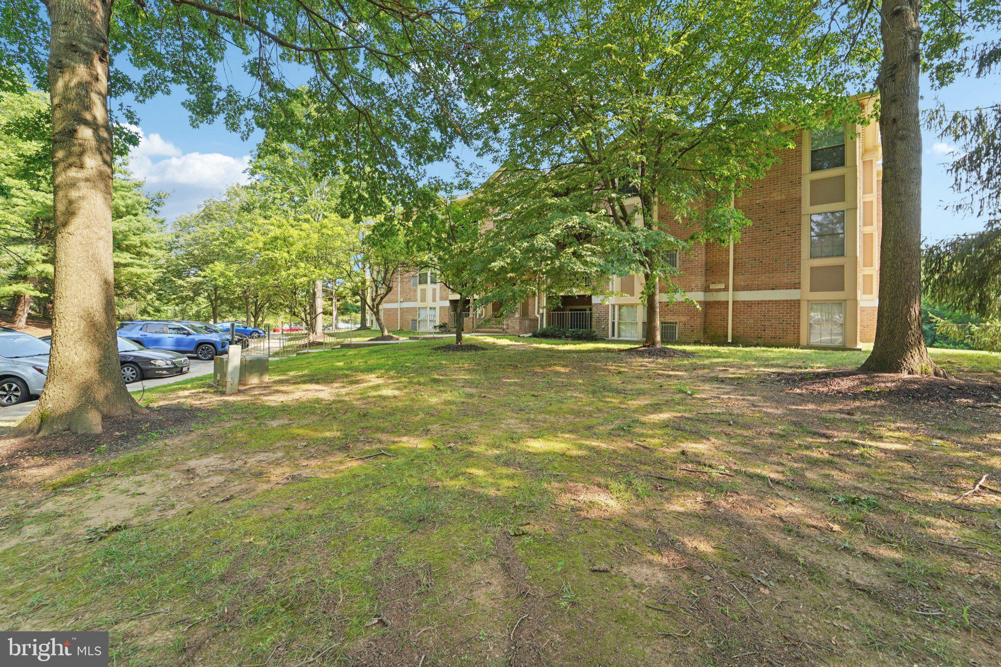 3500 Thomas Pointe Court, Unit 2B Abingdon, MD 21009 - Photo 35 of 37 a view of a tree in front of a house
