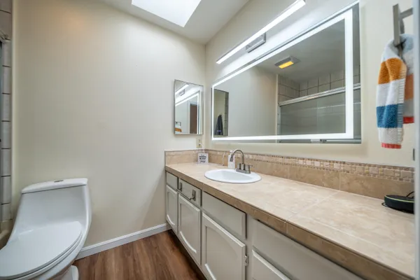 a bed room with a bed and a table