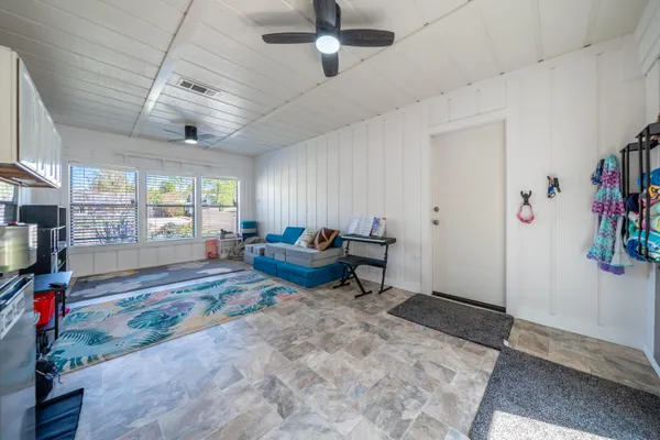 a outdoor living space with furniture and a couch