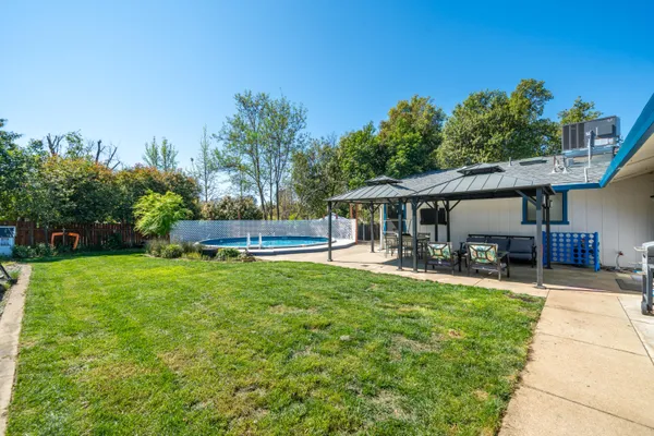 a view of a backyard with a garden