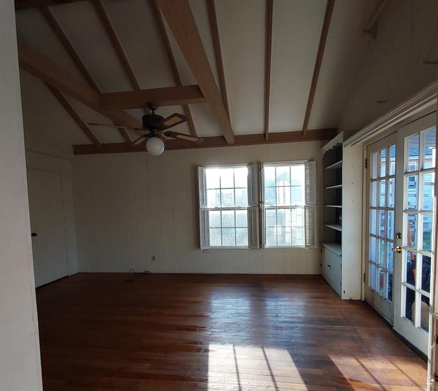 325 West 4th Street Tyler, TX 75701 - Photo 35 of 40 a view of empty room with wooden floor and fan