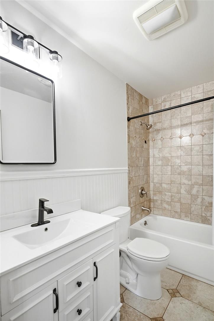463 North Penn Dixie Road Bath, PA 18014 - Photo 23 of 86 A pristine bathroom features modern fixtures and tile accents for a refreshing retreat.