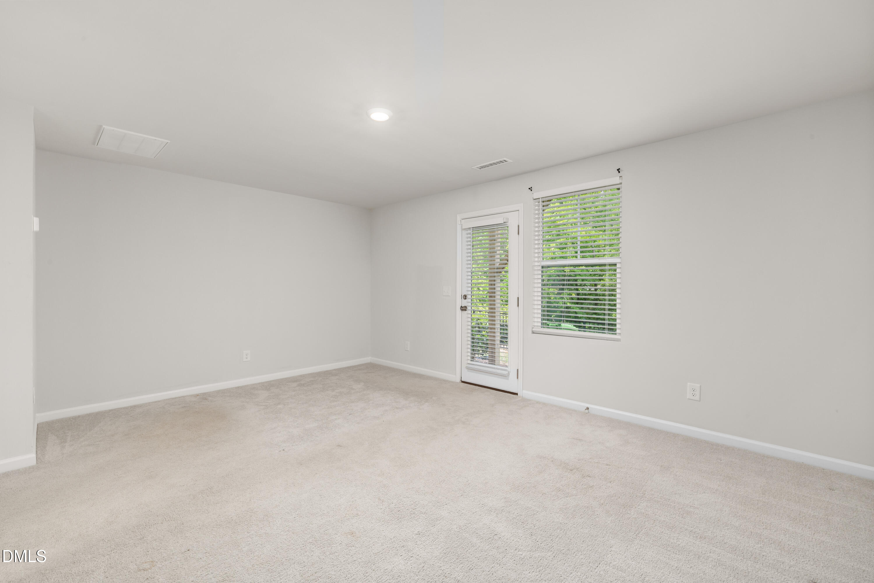 2524 Laurel Valley Way Raleigh, NC 27604 - Photo 9 of 12 an empty room with windows