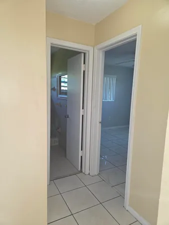 hallway view with wooden floor