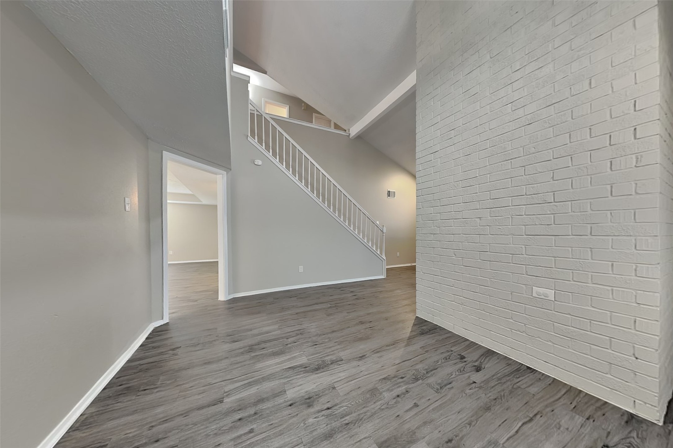 21606 Crescent Heights Street Spring, TX 77388 - Photo 11 of 23 a view of an empty room with wooden floor