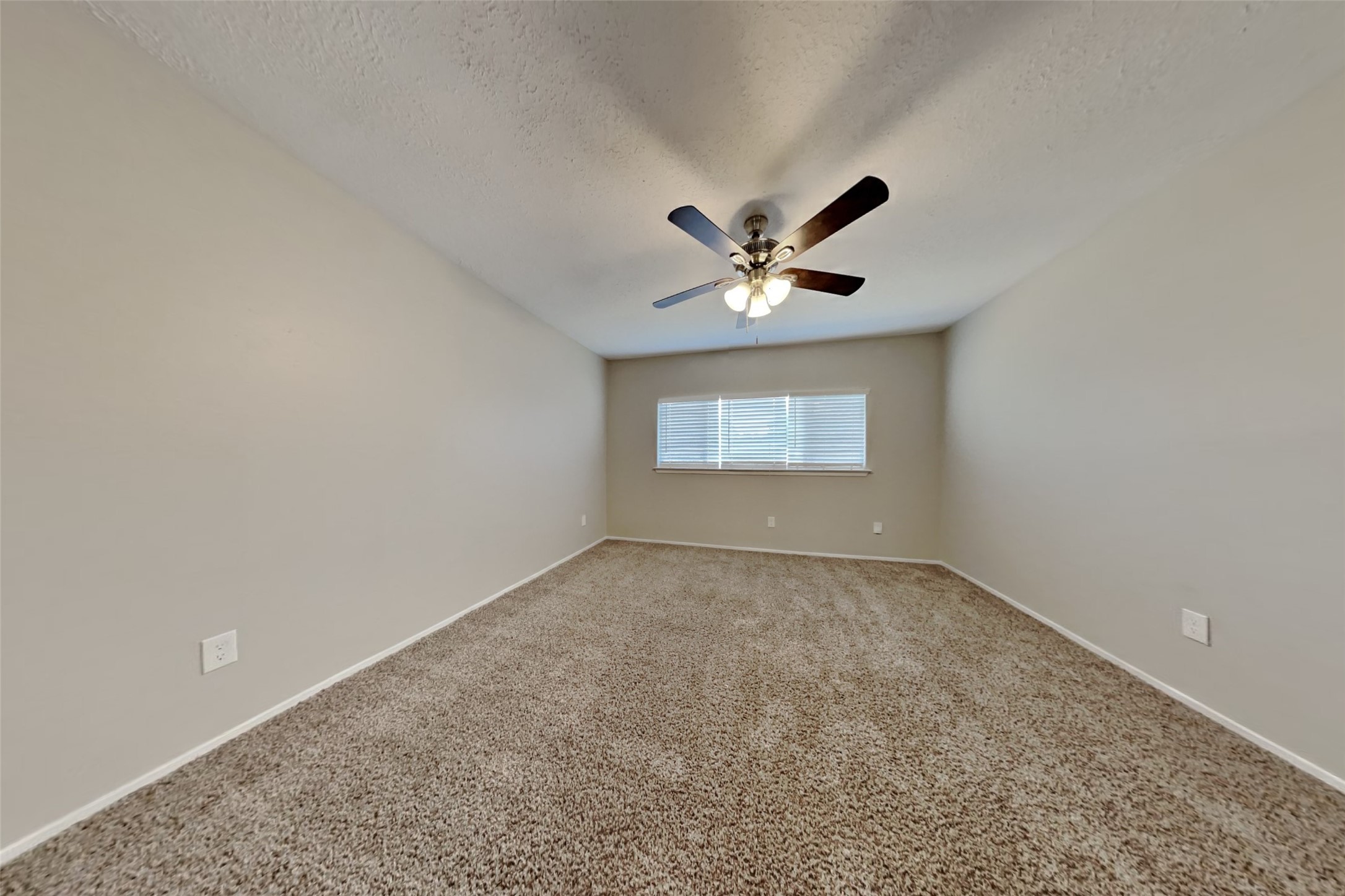 21606 Crescent Heights Street Spring, TX 77388 - Photo 4 of 23 an empty room with a view of a kitchen
