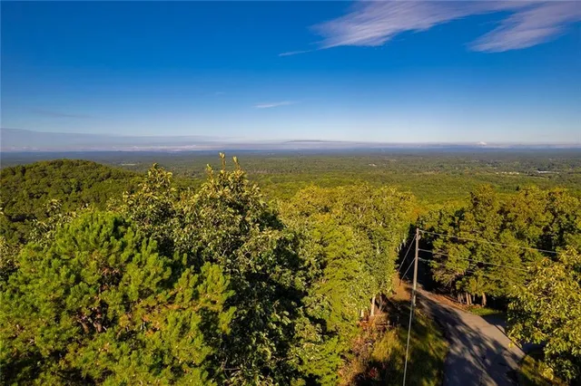 a view of a lake with a big yard