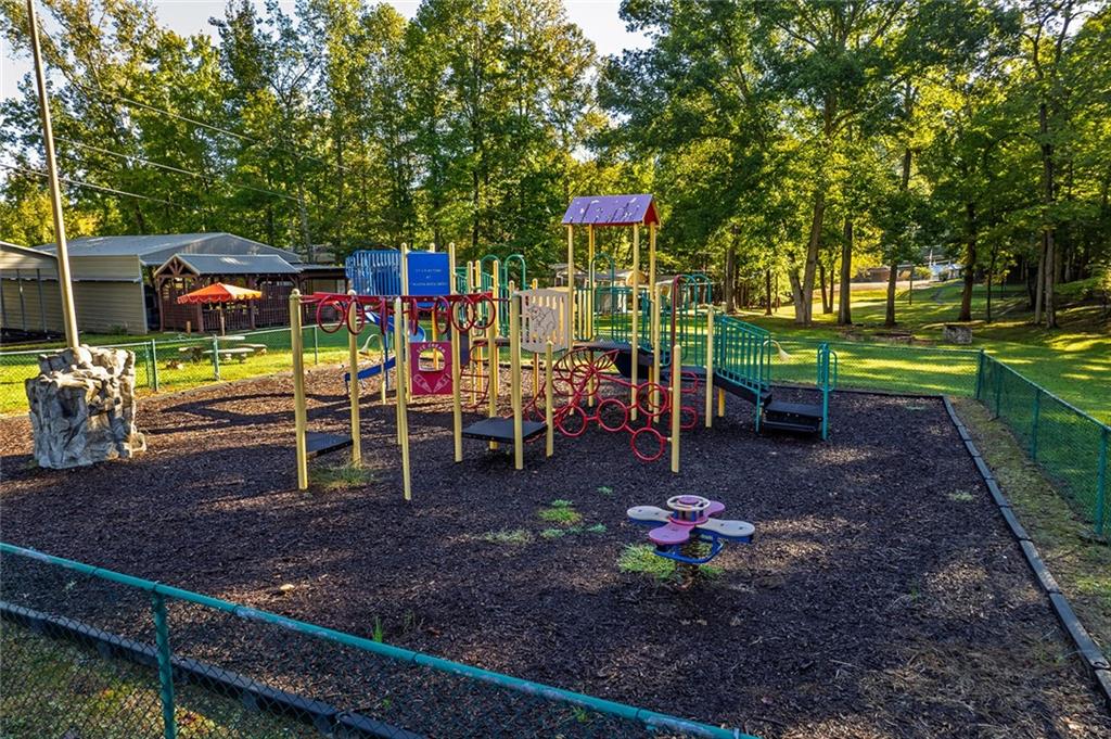 248 Stirratt Road Ranger, GA 30734 - Photo 16 of 24 a view of a park with sitting area