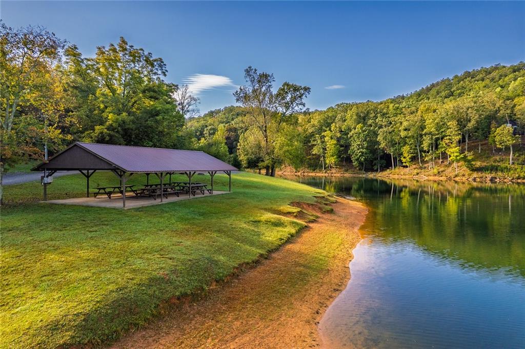 248 Stirratt Road Ranger, GA 30734 - Photo 18 of 24 a view of a lake with a big yard