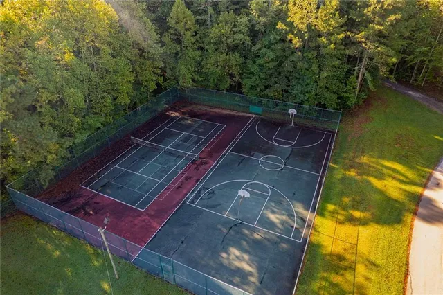 a view of a backyard with sitting area