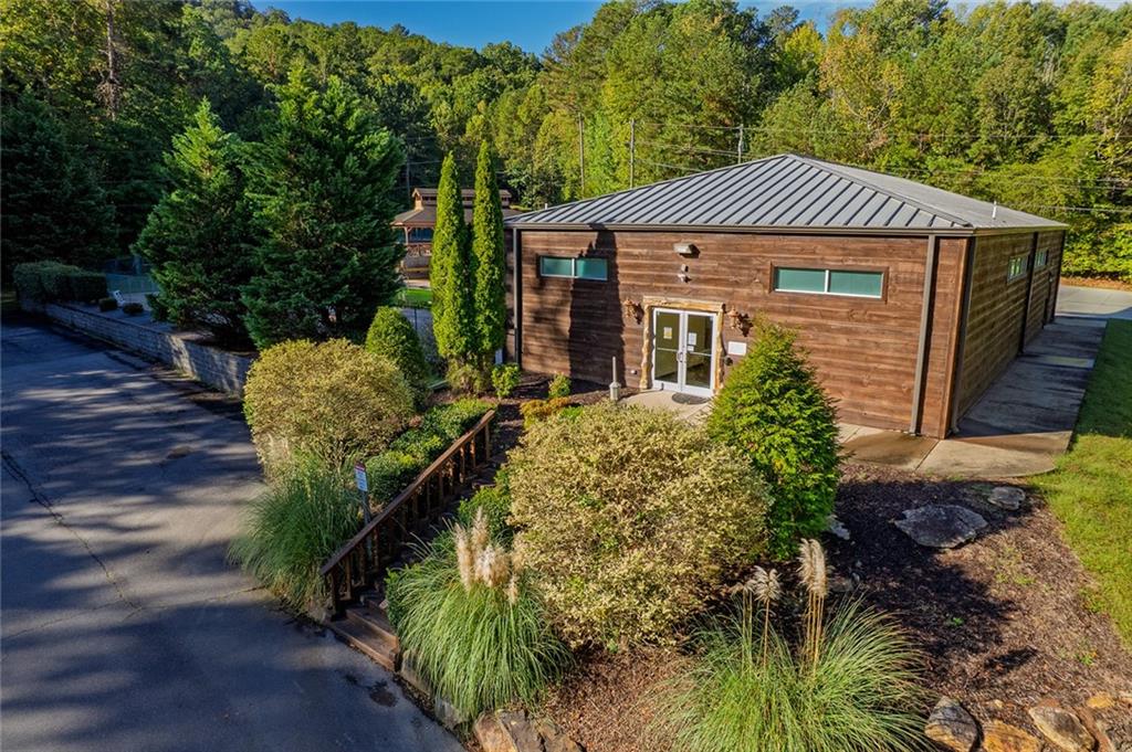 248 Stirratt Road Ranger, GA 30734 - Photo 22 of 24 a front view of a house with a yard