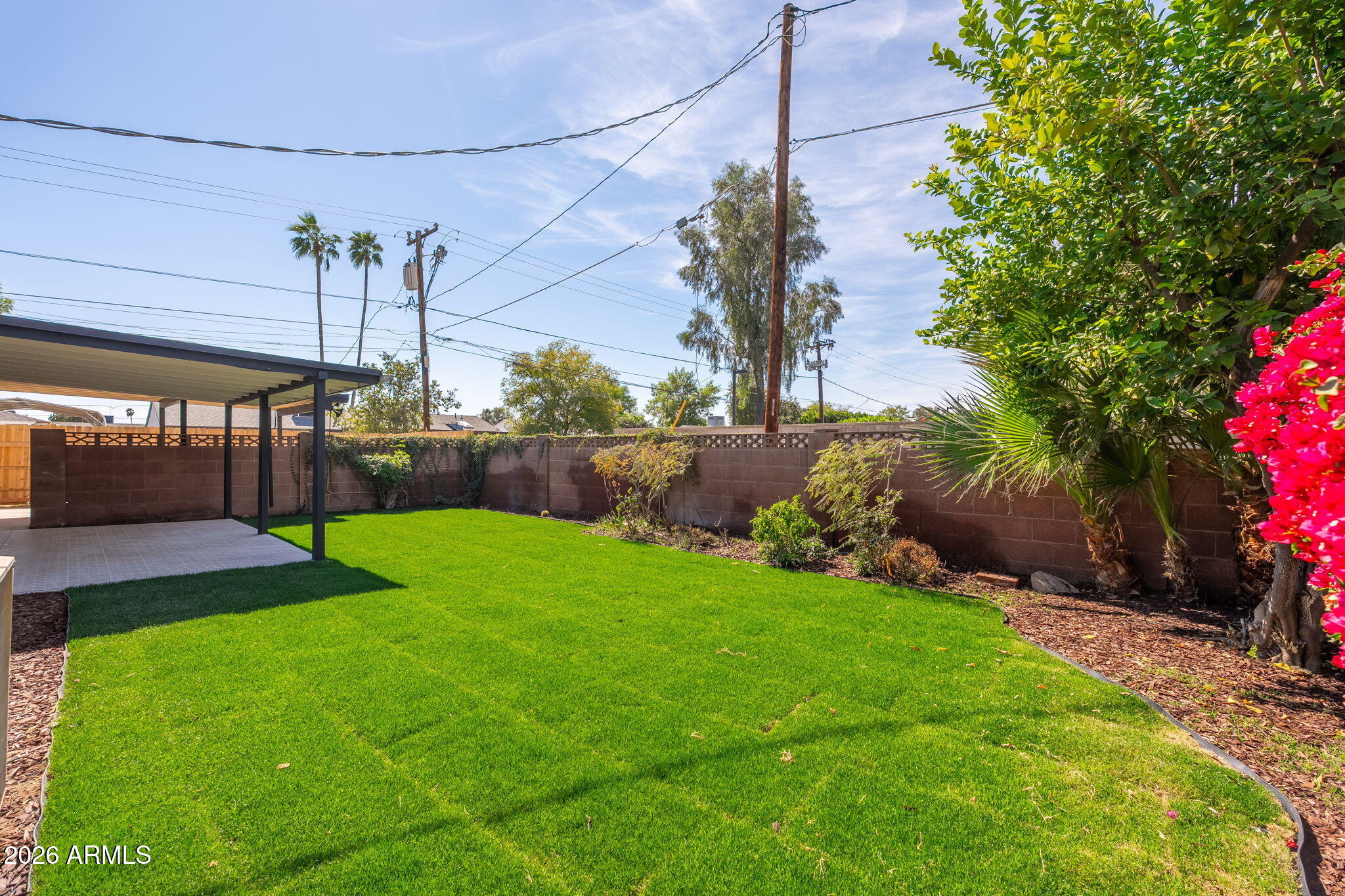 6134 North 9th Street Phoenix, AZ 85014 - Photo 32 of 36 a view of a backyard with a garden