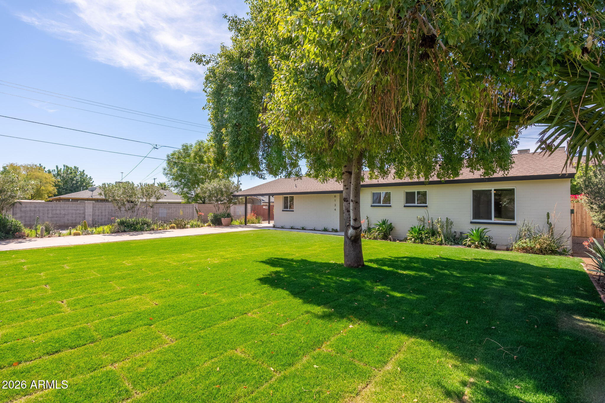 6134 North 9th Street Phoenix, AZ 85014 - Photo 33 of 36 a view of a house with a backyard