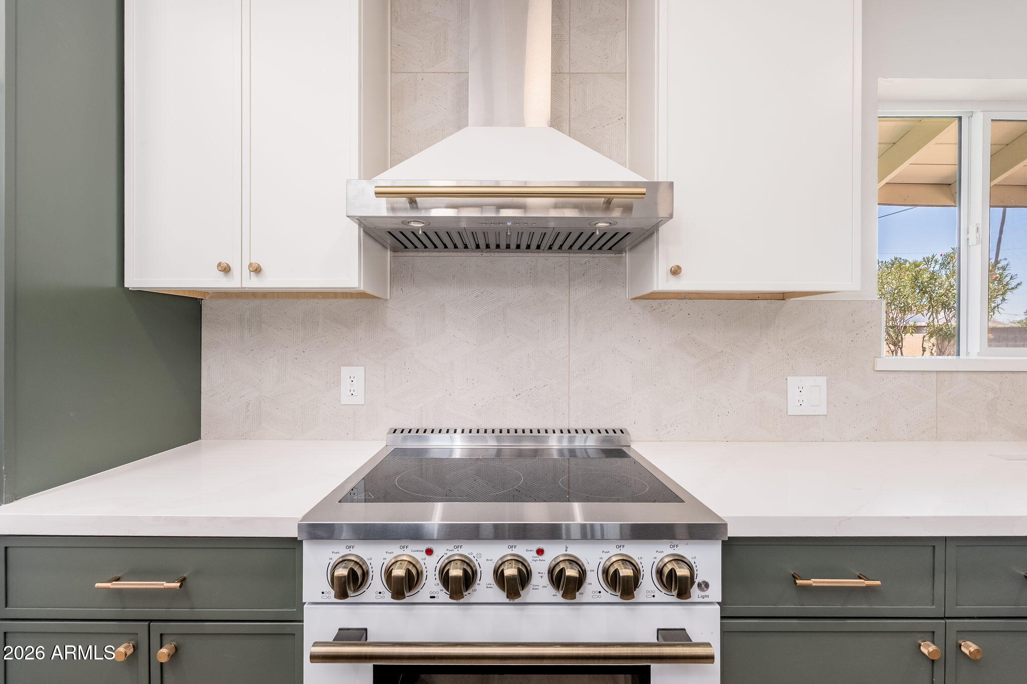 6134 North 9th Street Phoenix, AZ 85014 - Photo 5 of 36 a stove top oven sitting inside of a kitchen