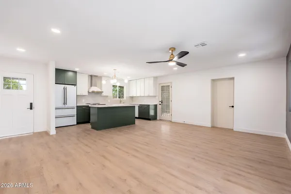 a view of kitchen with stainless steel appliances kitchen island a sink and dishwasher