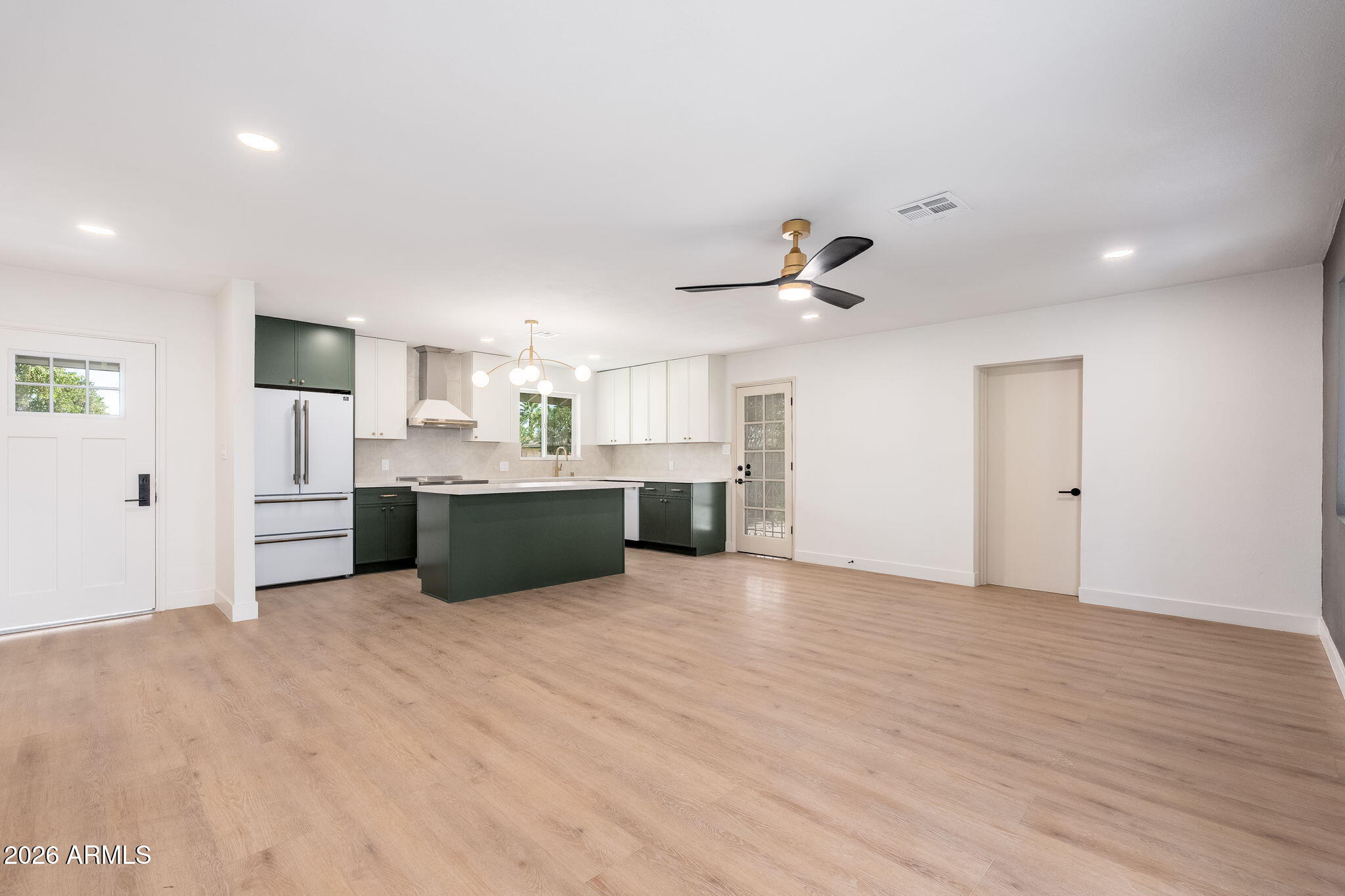 6134 North 9th Street Phoenix, AZ 85014 - Photo 7 of 36 a view of kitchen with stainless steel appliances kitchen island a sink and dishwasher