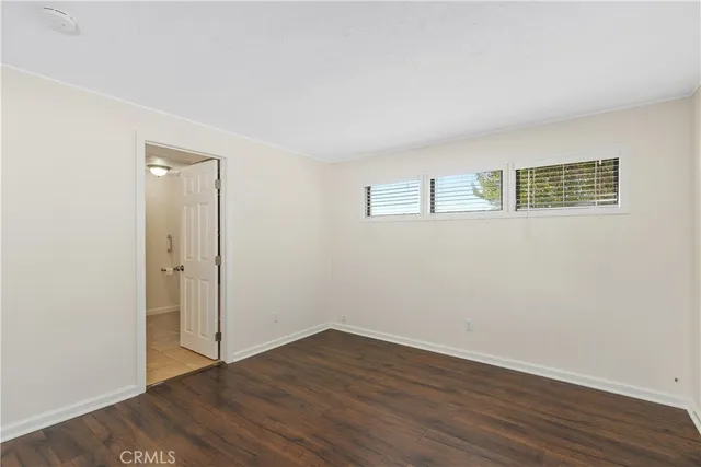 a bathroom with a double vanity sink and mirror