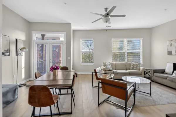 a living room with furniture and a window
