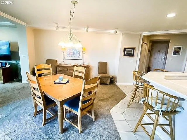 a living room with furniture fireplace and a large window