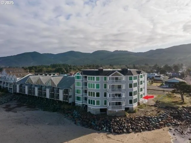 a view of houses with a street